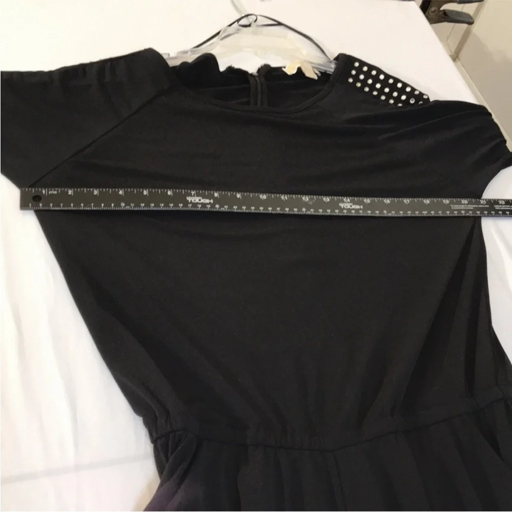 Micheal Kors size medium black long sleeve jumpsuit rhinestone embellished